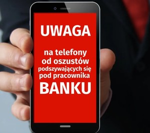 telefon z napisem: uwaga na telefony od oszustów podszywających się pod pracownika banku